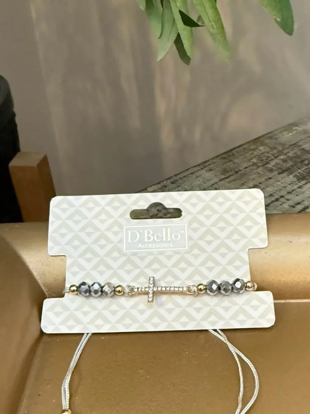 New D'Bello simulated  diamond, gold toned cross with beads bracelet.  Light gra